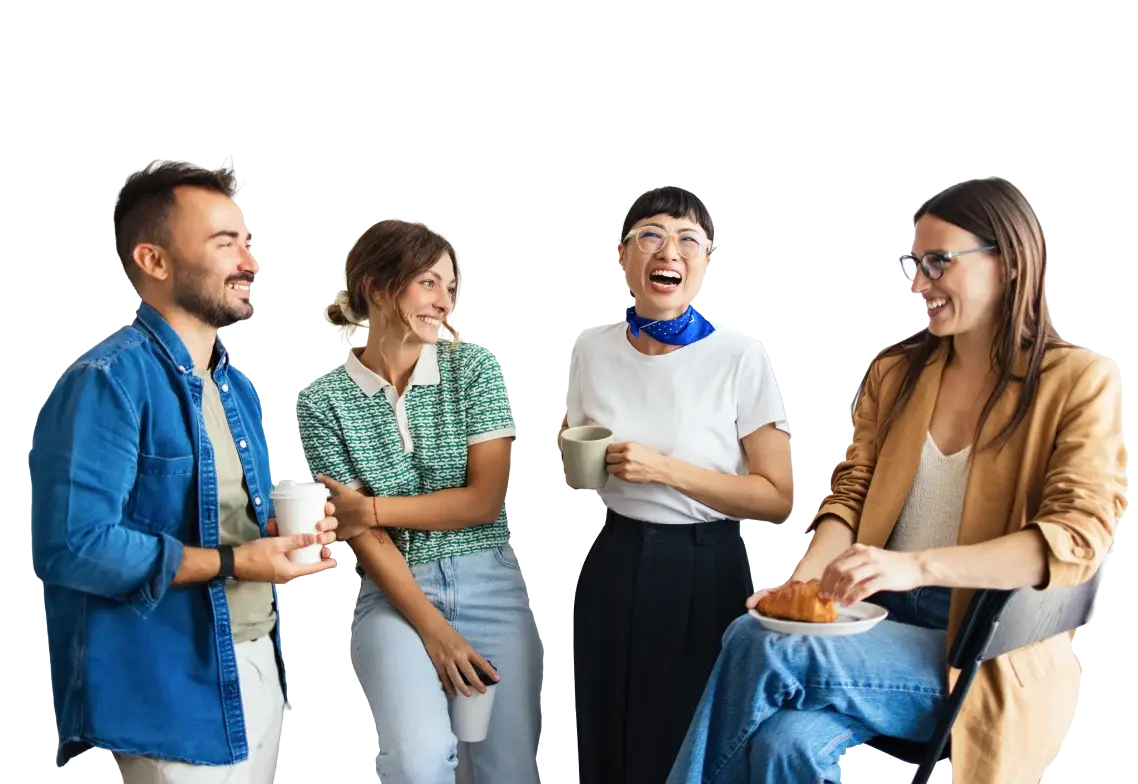 Four colleagues laughing together over coffee