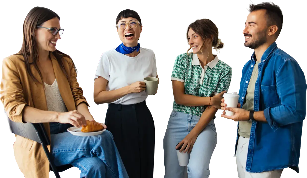 Four colleagues standing together and laughing